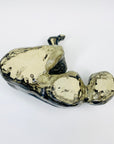 Australian pottery sculpture depicting woman clutching her stomach