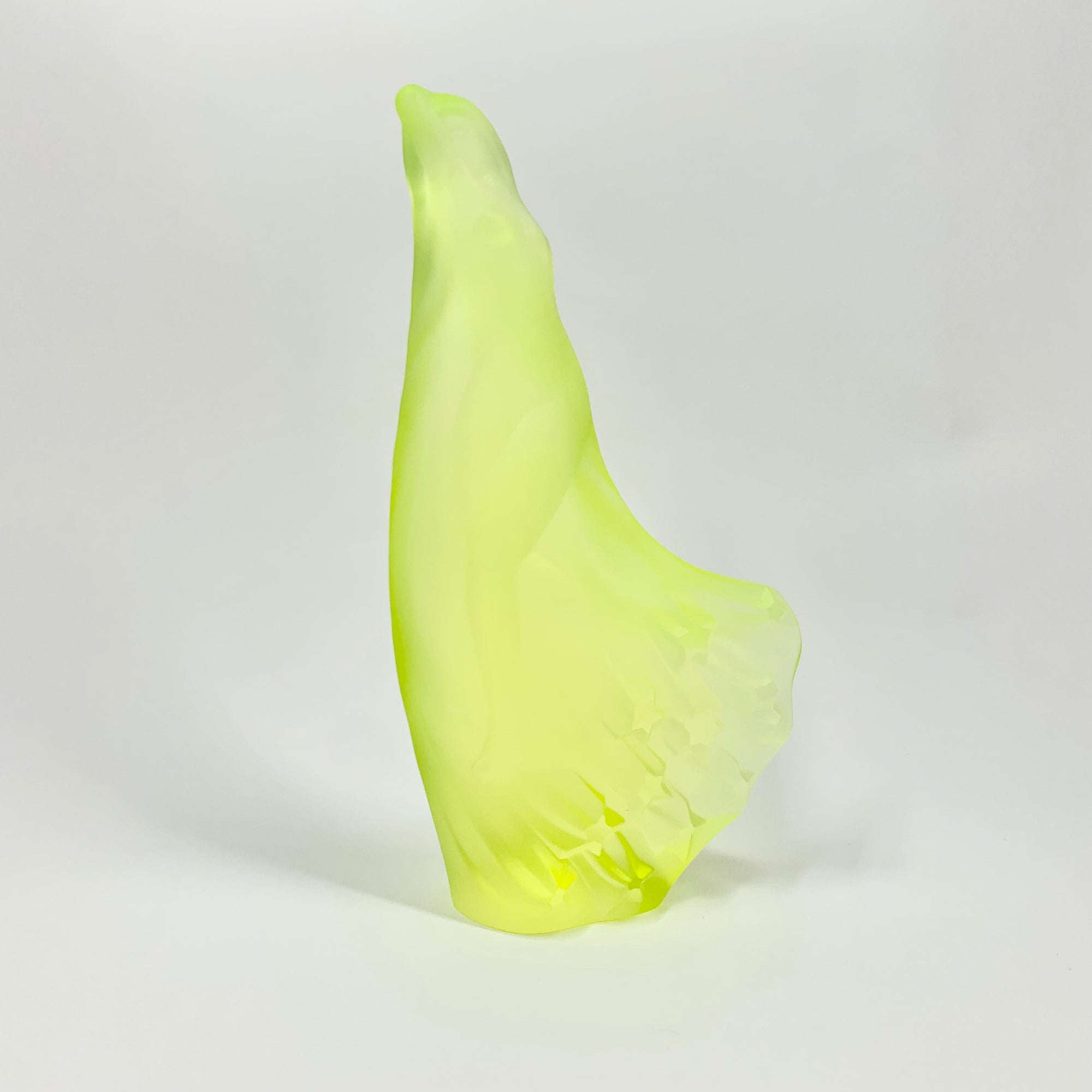 Art Deco reproduction of Lalique Nude with star bangle cape figurine in uranium glass