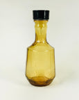 Midcentury glass oil carafe with plastic lid