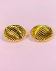 Rare 1970s triple gold plated ribbed cocoon clip on earrings by Monet
