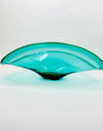 Vintage large hand made turquoise glass wave bowl with crisscross base