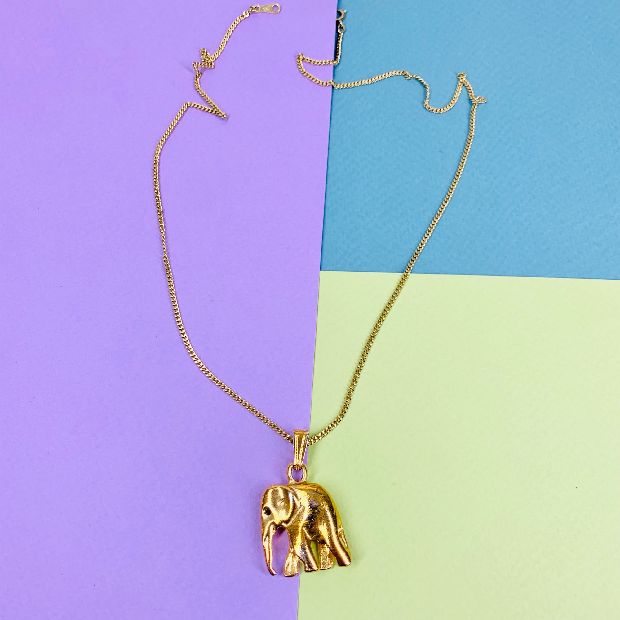 Vintage gold plated necklace with copper elephant pendant