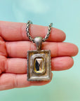 Vintage silver plated necklace with rectangular amber glass paste pendant
