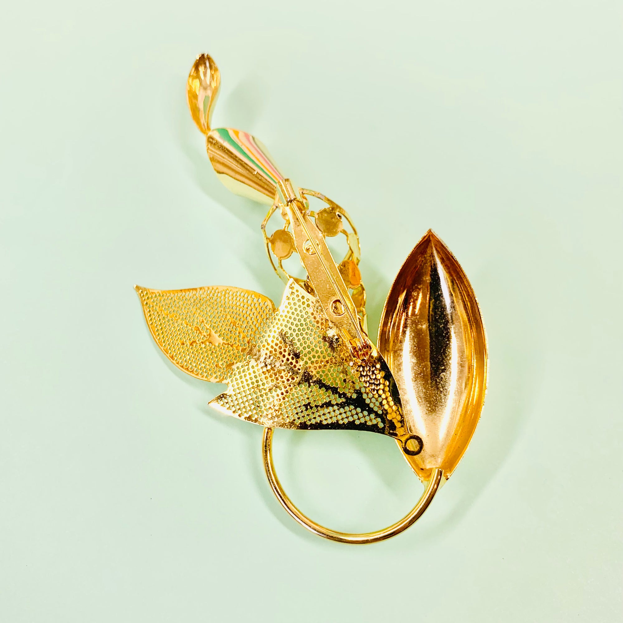 1970s flower brooch with center rhinestone