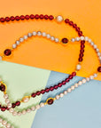 1960s gold plated Avon costume pearl and amethyst string necklace