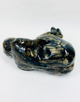 Australian pottery sculpture depicting woman clutching her stomach