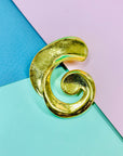 1980s gold plated scroll brooch