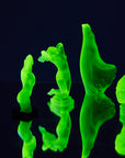 Art Deco reproduction of Lalique Nude with star bangle cape figurine in uranium glass