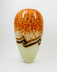 Vintage hand made orange cased art glass vase with abstract pattern