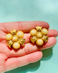 Rare 1980s matte triple gold plated gold matte pearl flower clip on earrings by Monet
