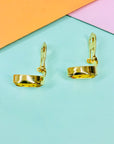 Vintage triple gold plated clip in button earrings with amber rhinestone by Pierre Lang