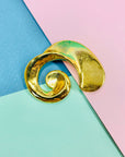 1980s gold plated scroll brooch