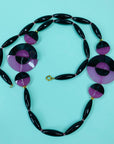 Rare groovy 1970s purple and black beaded necklace