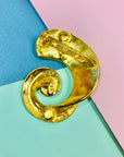 1980s gold plated scroll brooch
