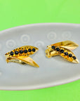 1960s brass clip on wings earrings with black beads