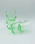 Extremely rare antique Art Deco green glass tea cup and matching saucer