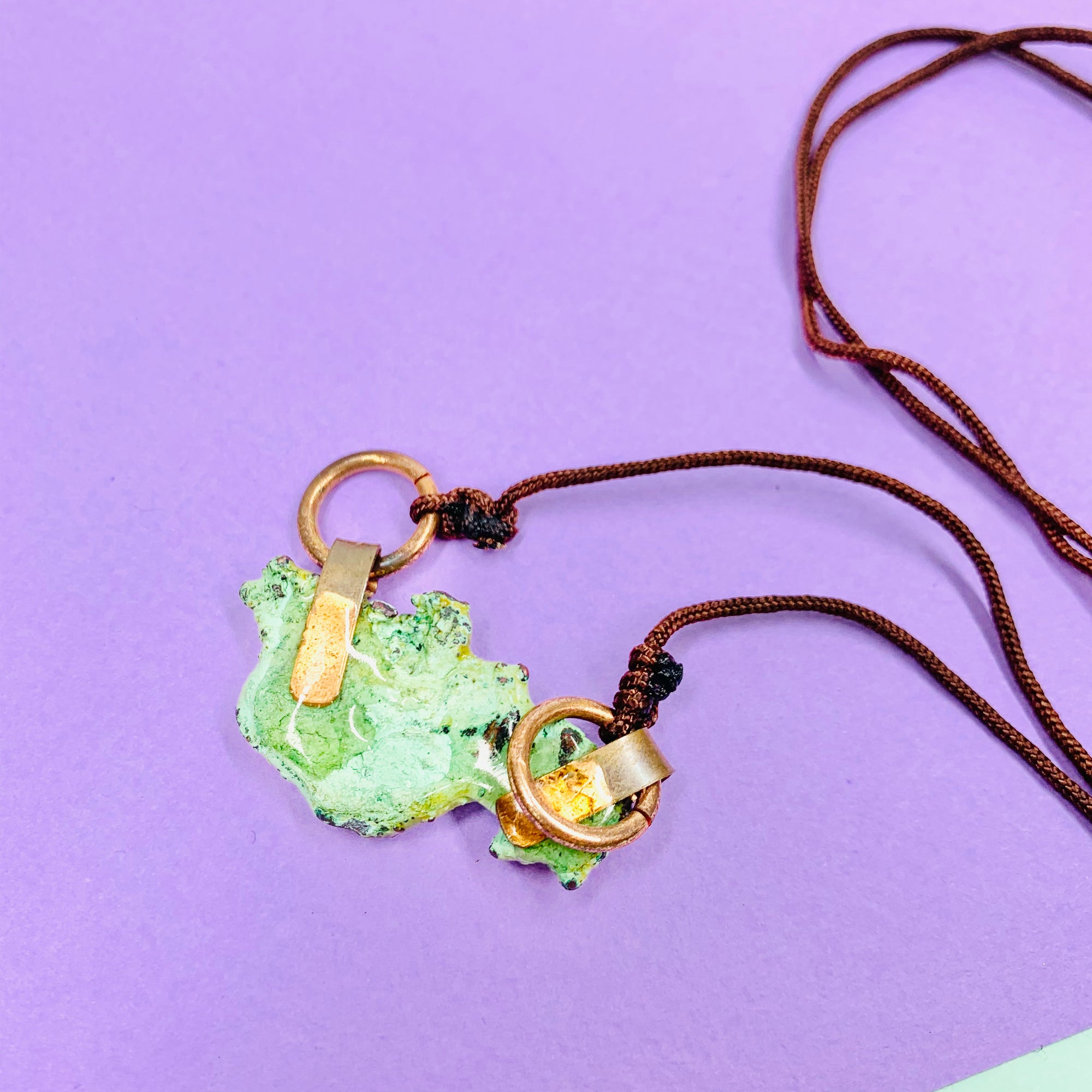 Hand made raw copper nugget pendant on brown cord
