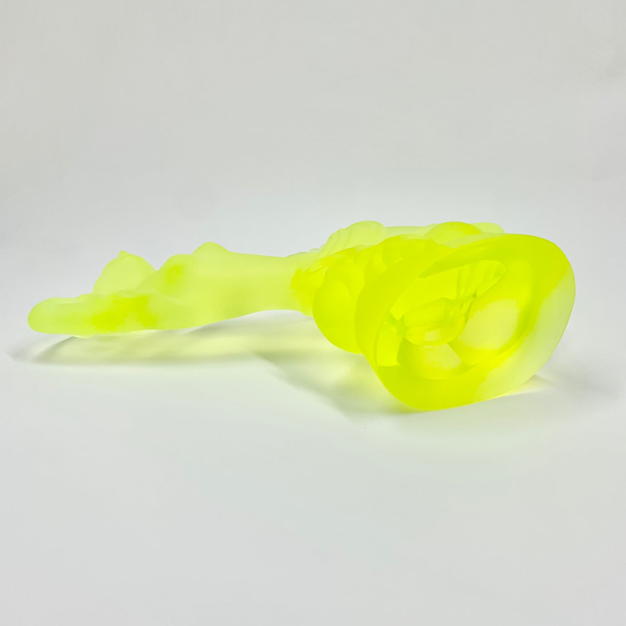 Art Deco reproduction of Lalique lie down Nude with star bangle cape figurine in uranium glass