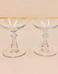 Antique crystal champagne coupe with gold gilding rim