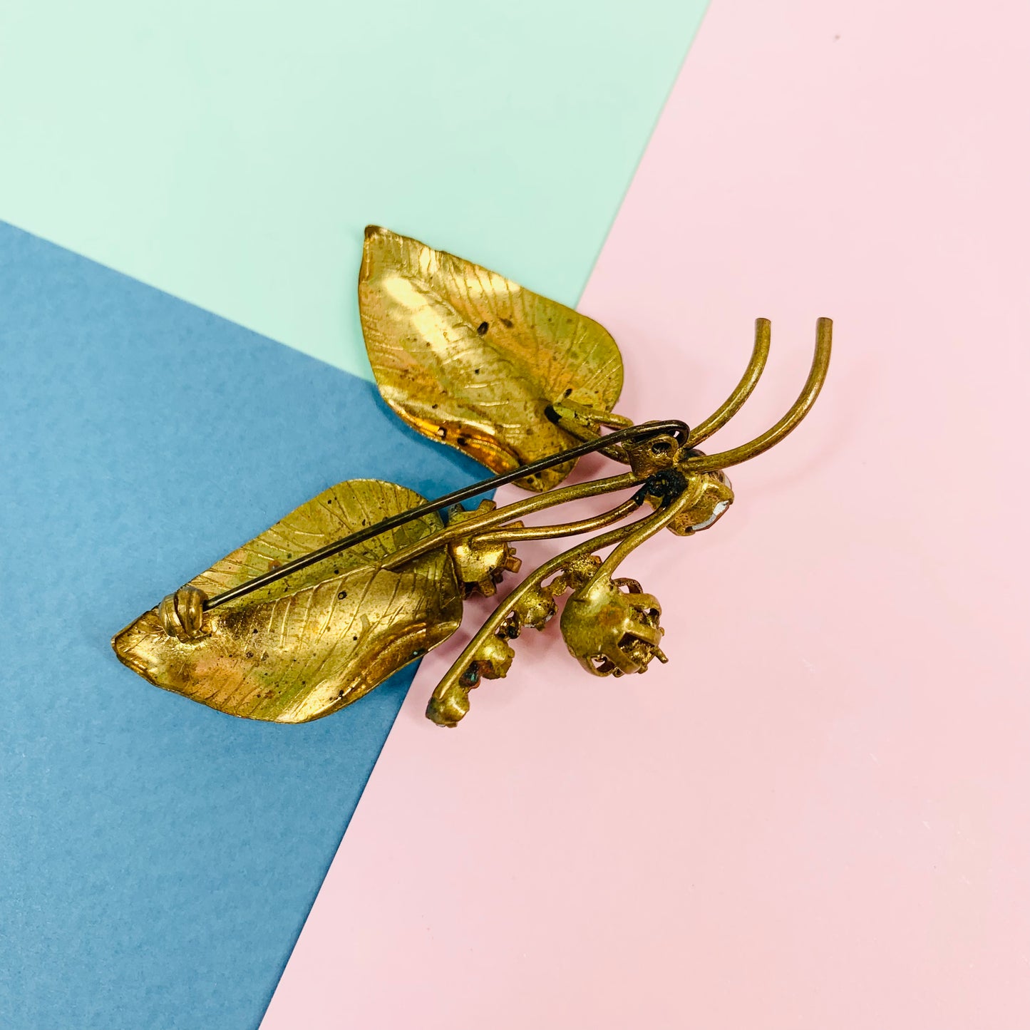 1940s iridescent leafy brooch with rhinestones