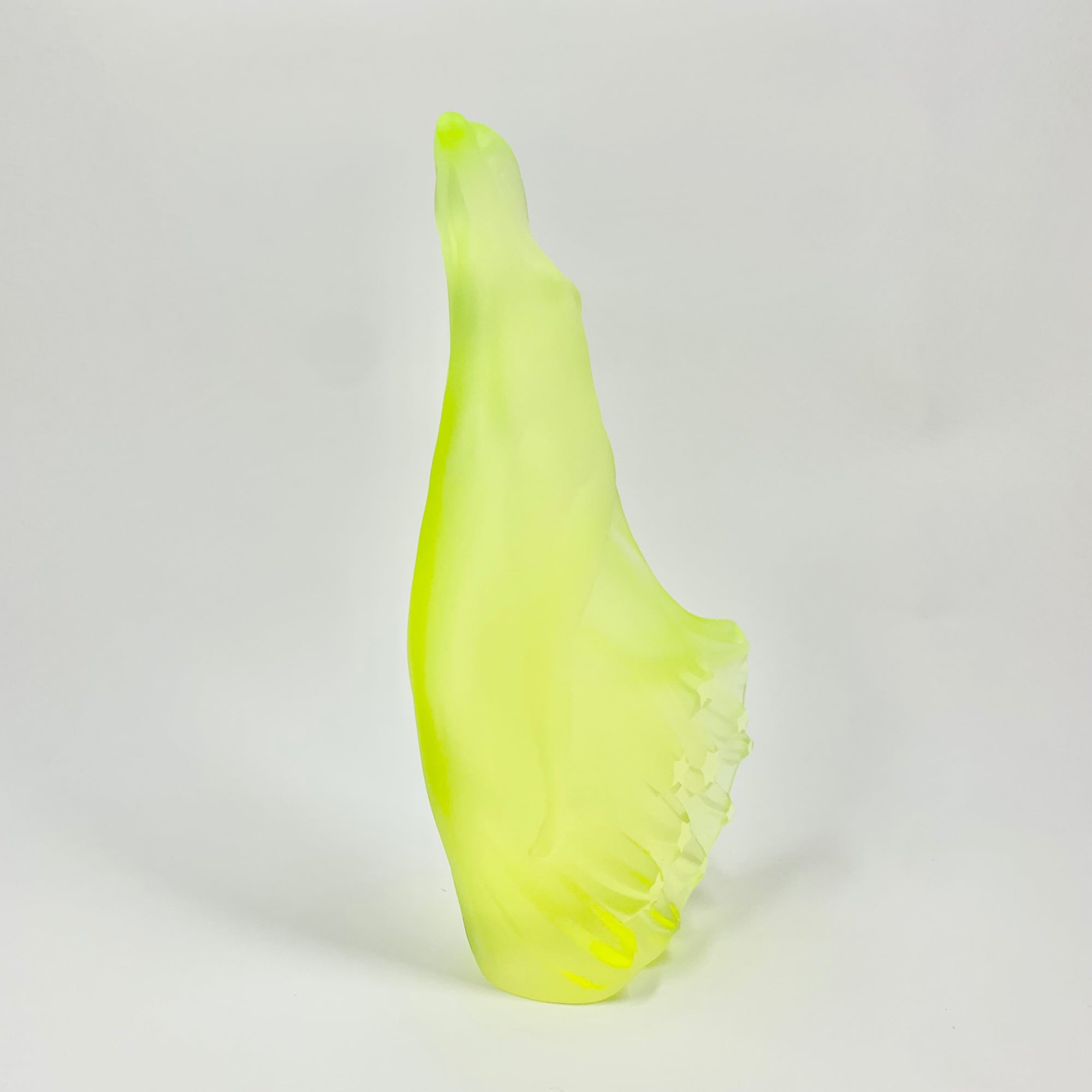 Art Deco reproduction of Lalique Nude with star bangle cape figurine in uranium glass