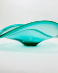 Vintage large hand made turquoise glass wave bowl with crisscross base