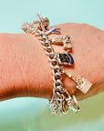 Midcentury English sterling silver charm bracelet