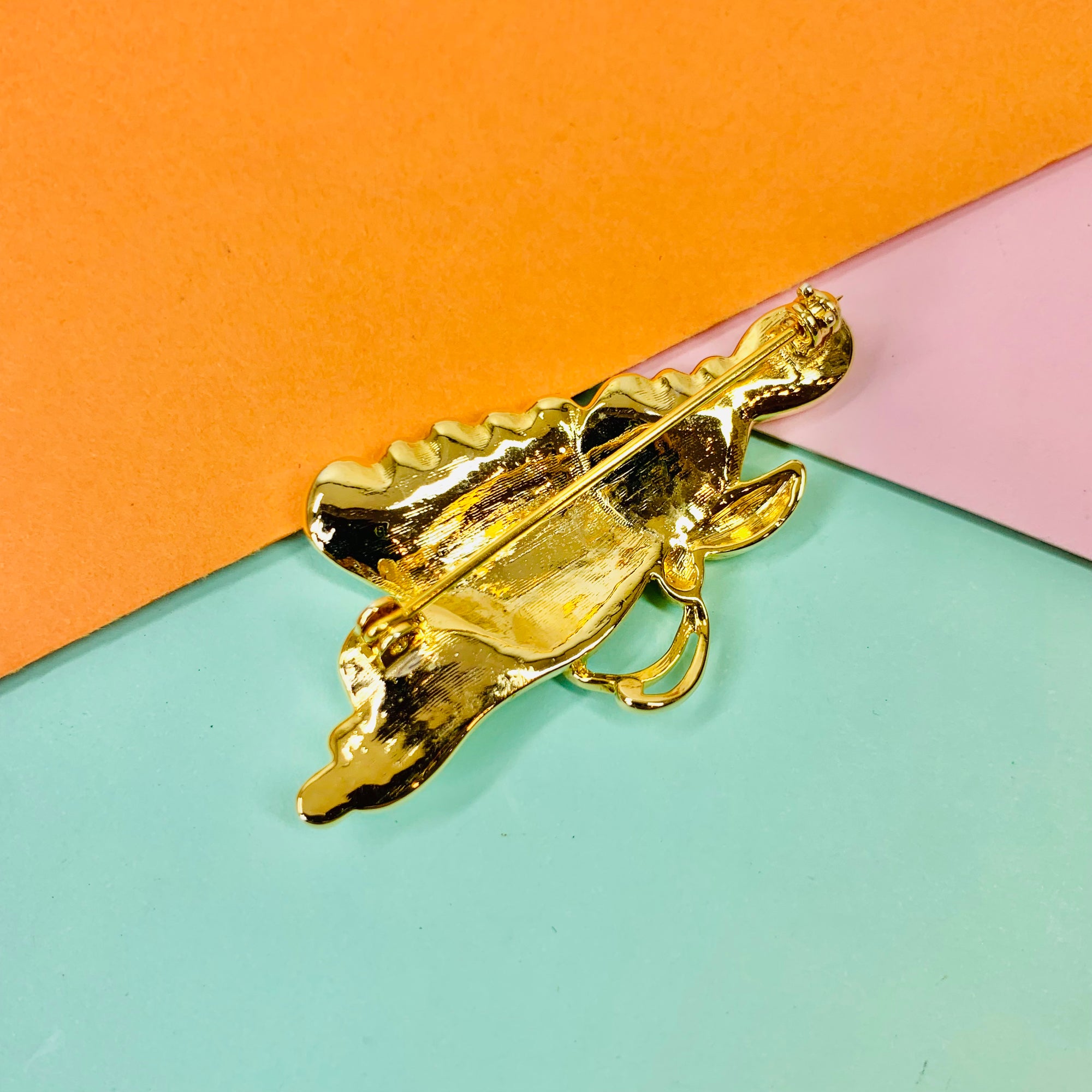 1980s plated alloy butterfly brooch with rhinestones