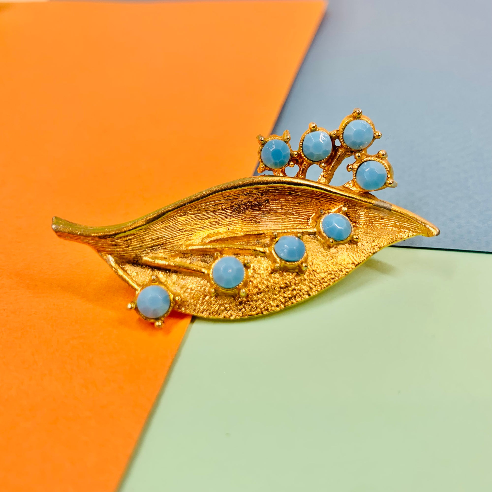1970s plated alloy leaf brooch with turquoise beads