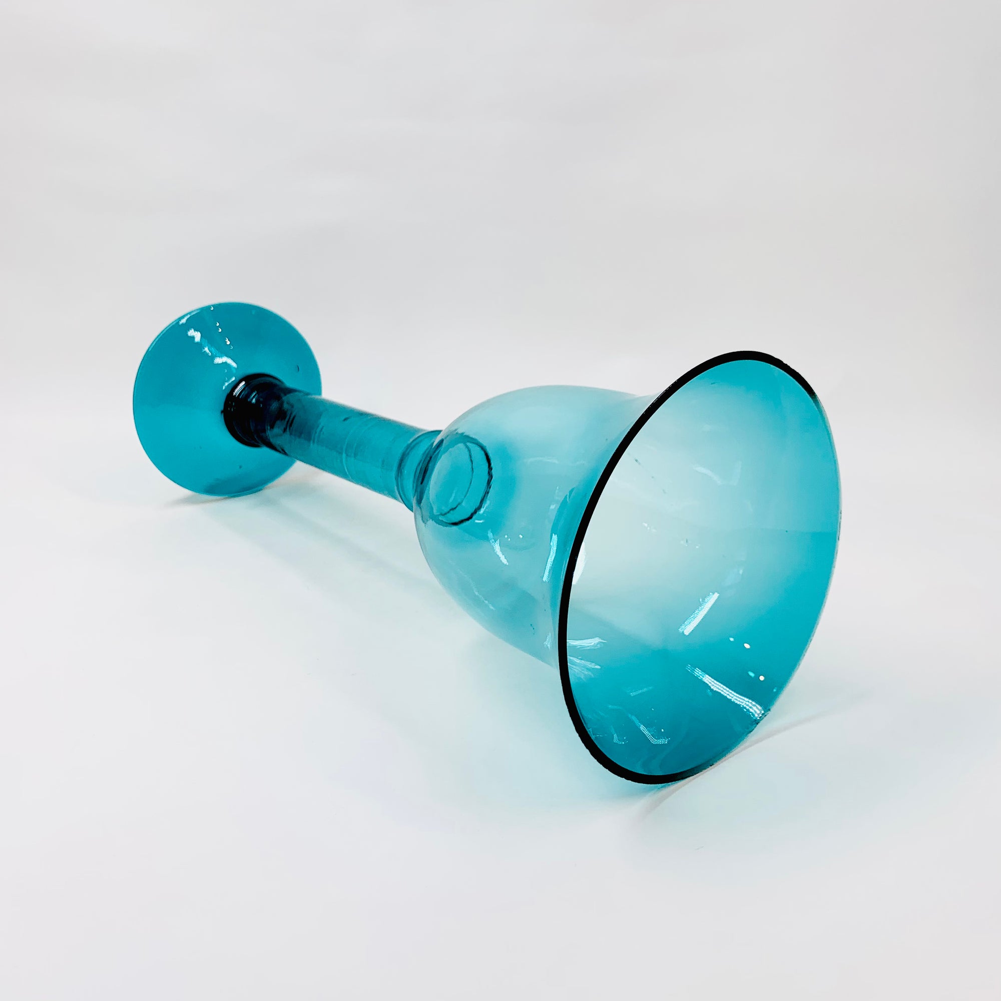 Vintage turquoise glass footed vase/candle holder