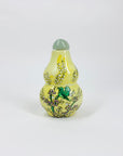 Antique Chinese hand painted yellow porcelain snuff bottle with jade stopper