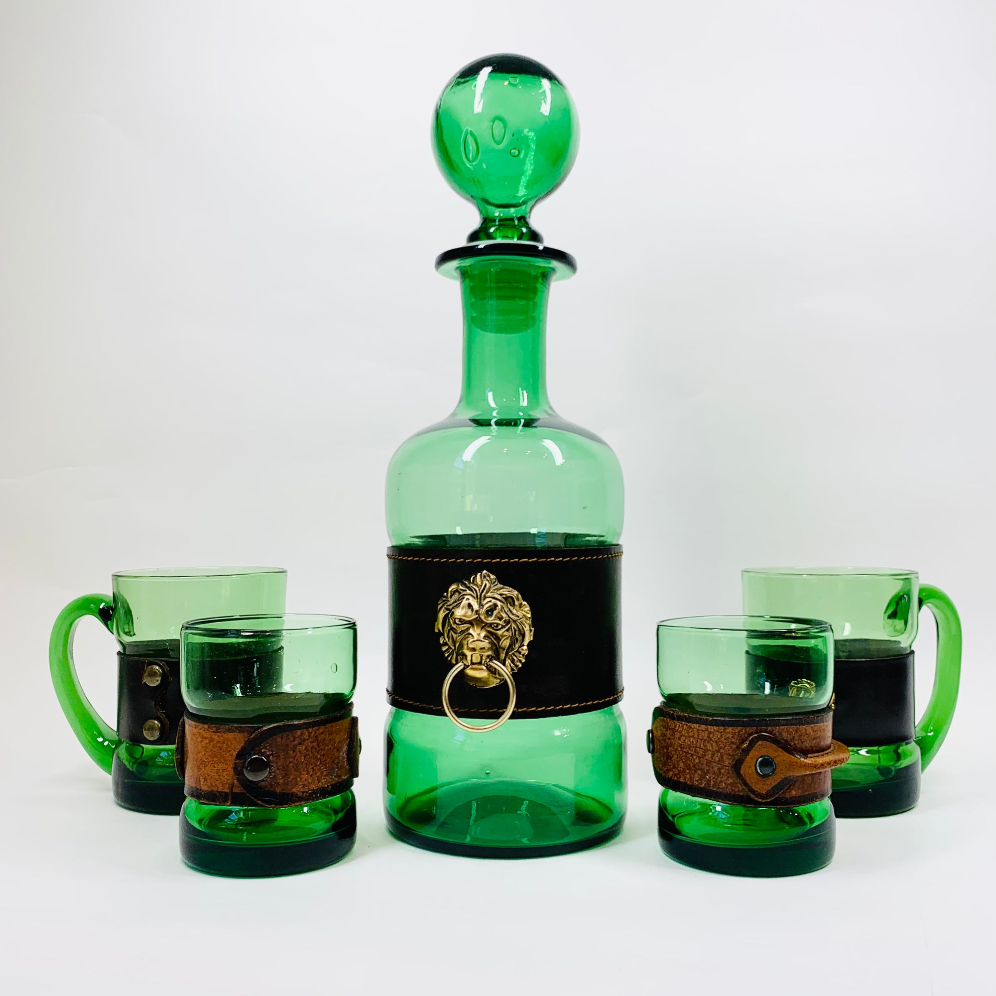 Rare Midcentury Italian green glass set with detachable leather sleeves