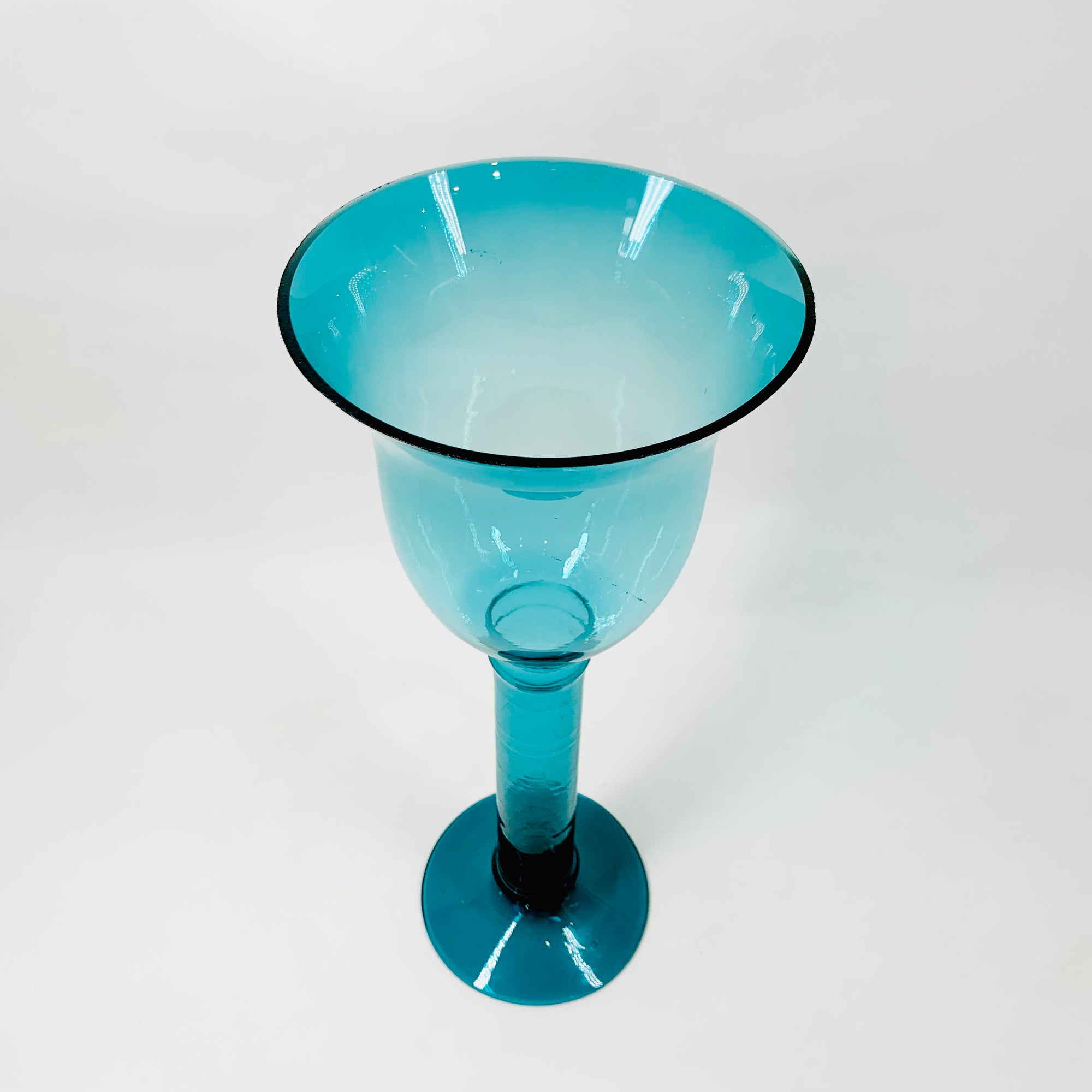 Vintage turquoise glass footed vase/candle holder
