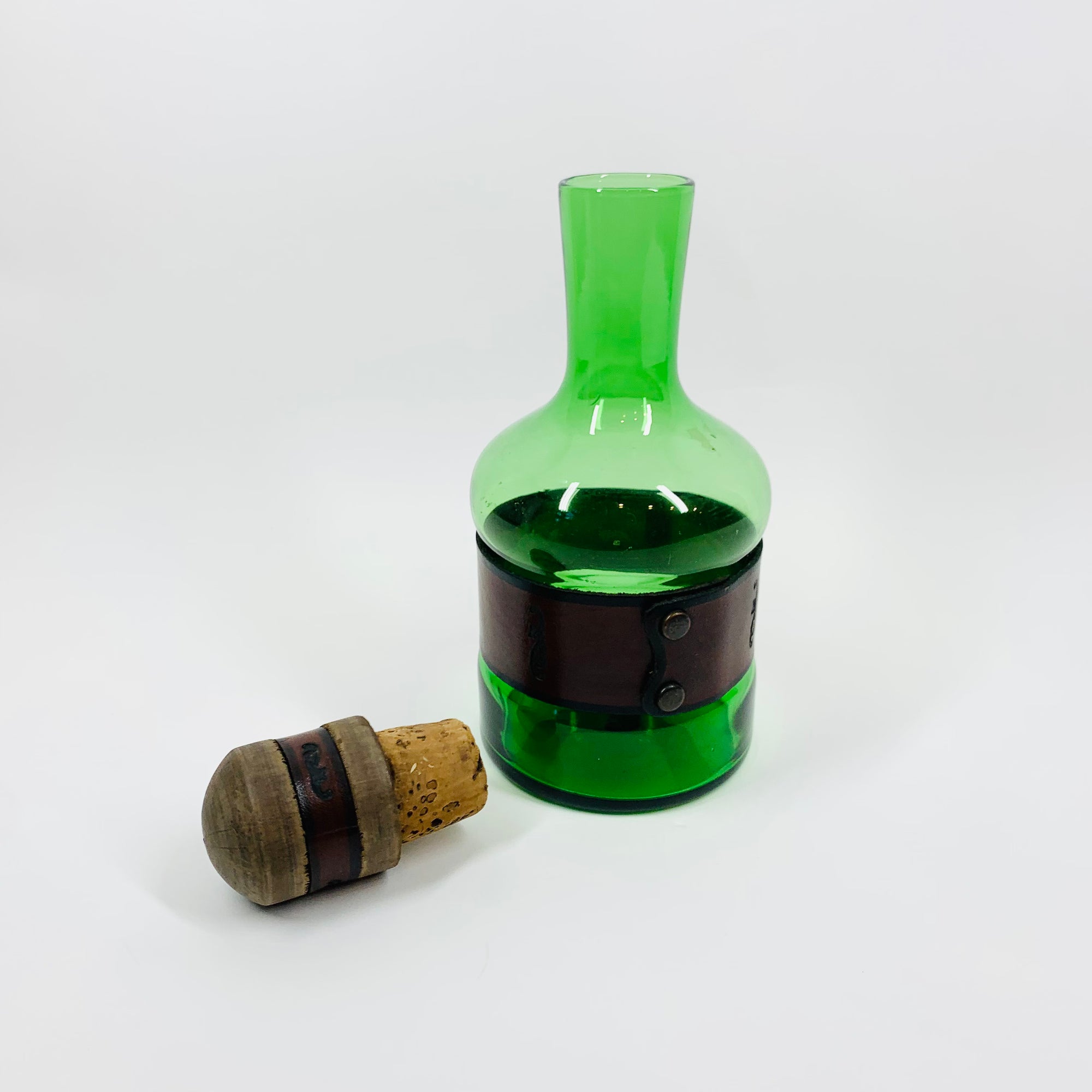 Rare Midcentury Italian green glass set with detachable leather sleeves