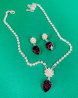 Brand new vintage costume necklace earrings suite with clear and purple rhinestones
