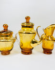 Antique Bohemian amber glass tea set with gold gilding