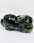 Australian pottery sculpture depicting woman clutching her stomach