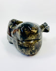 Australian pottery sculpture depicting woman clutching her stomach