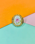 Antique gilt metal brooch with seed pearls and hand painted rose porcelain