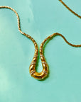 1970s Avon gold plated flat link necklace with rhinestones pendant