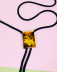 Extremely rare Midcentury Chinese carved amber bolo tie
