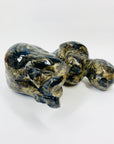 Australian pottery sculpture depicting woman clutching her stomach
