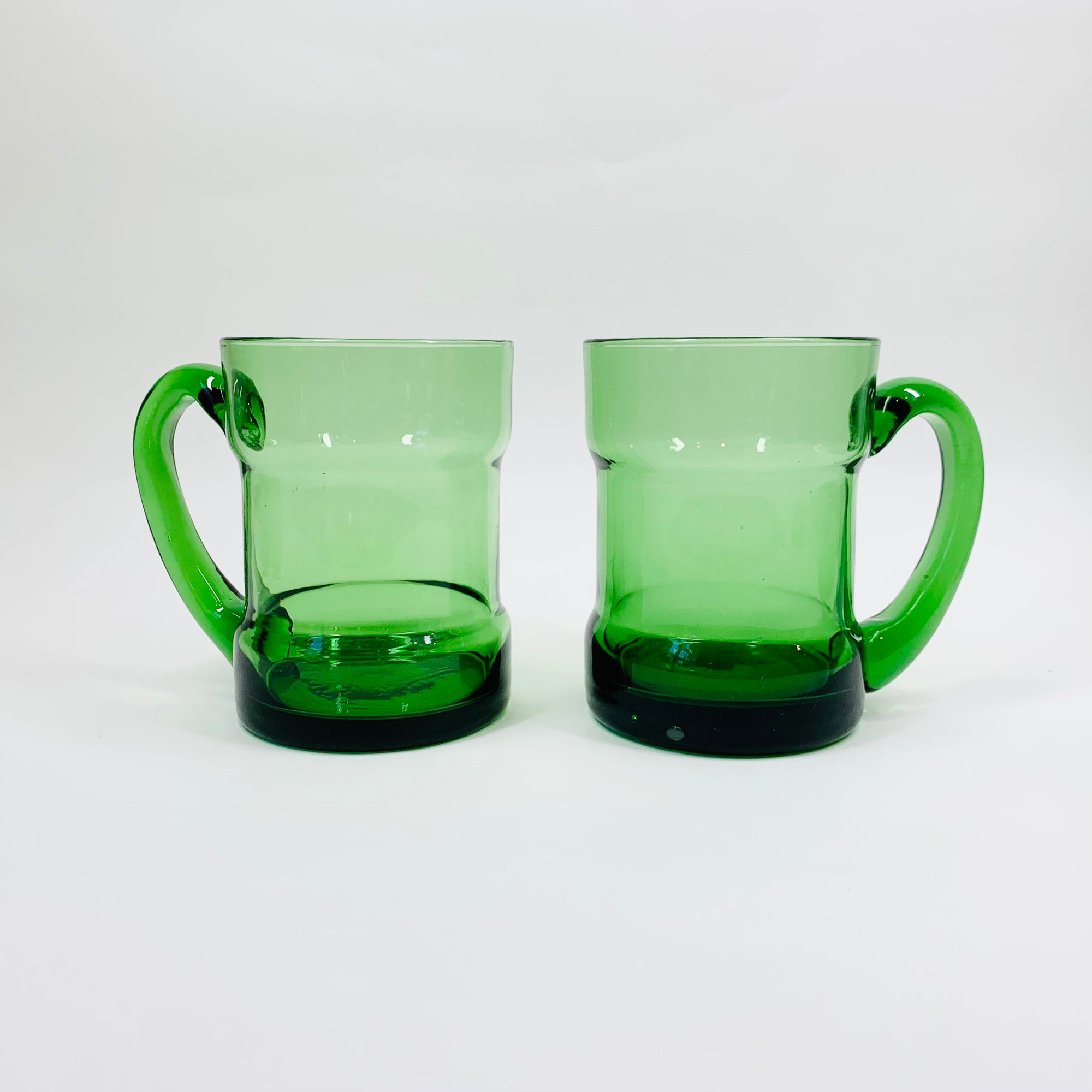 Rare Midcentury Italian green glass set with detachable leather sleeves