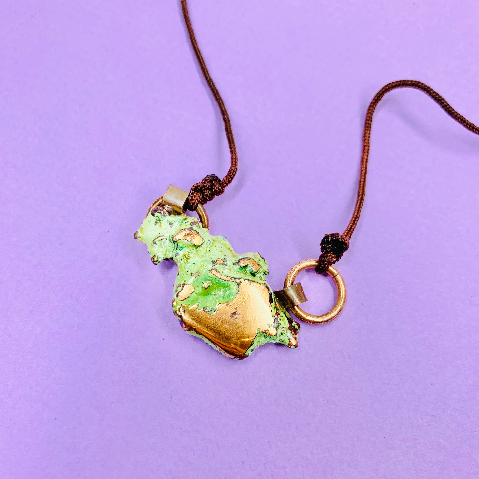 Hand made raw copper nugget pendant on brown cord
