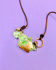 Hand made raw copper nugget pendant on brown cord