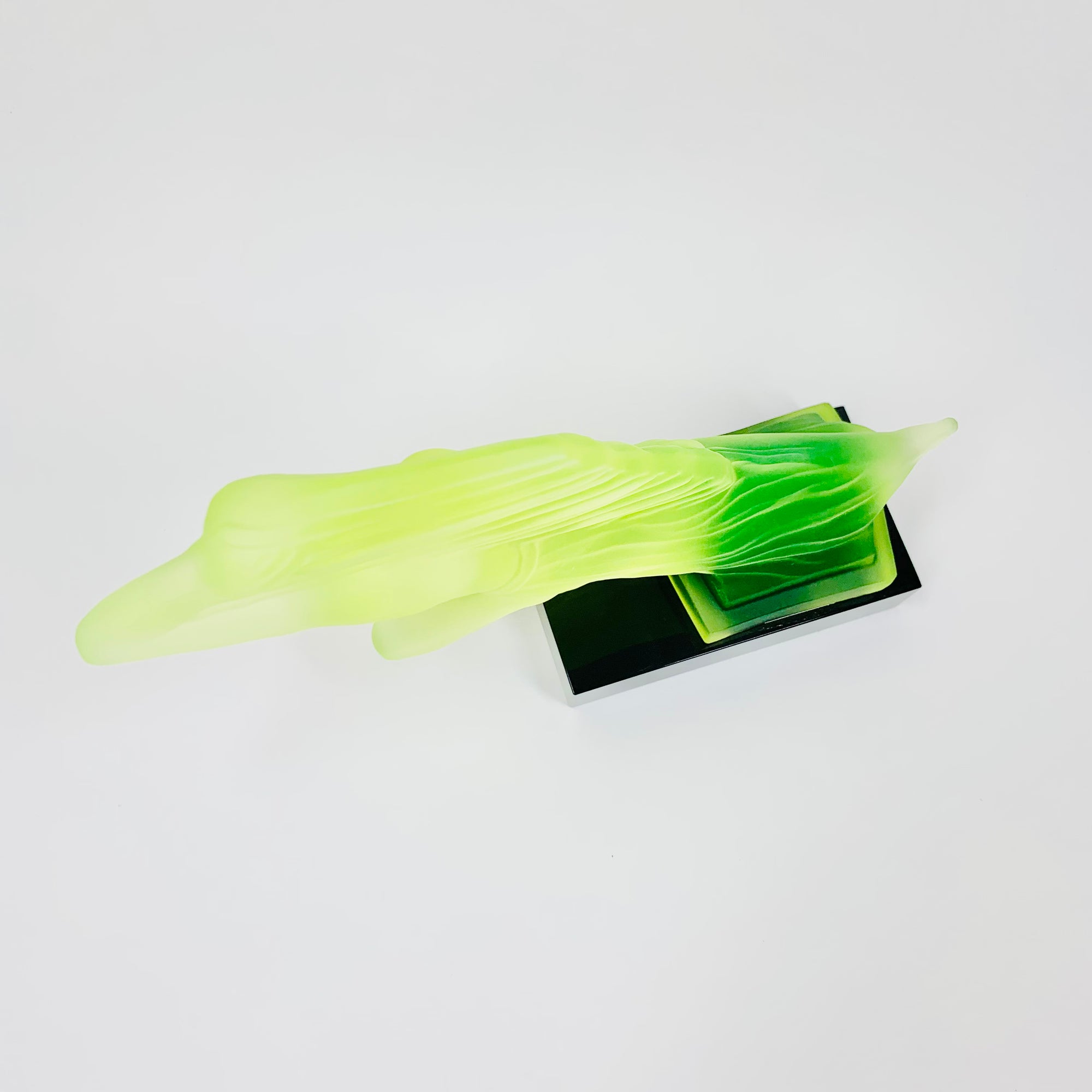 Art Deco reproduction of Lalique car mascot in uranium glass