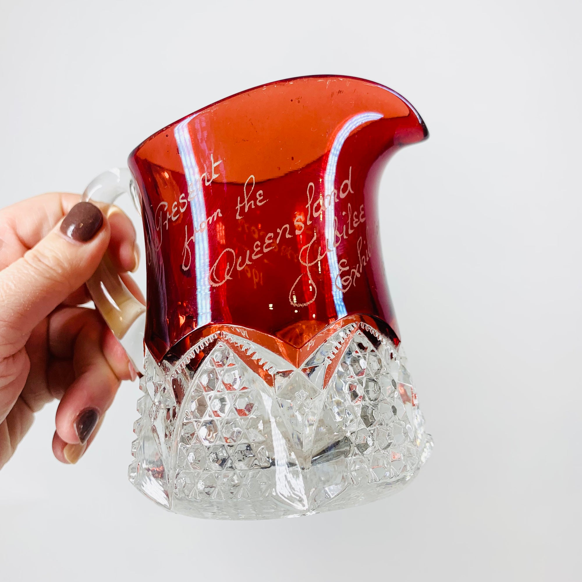 Antique ruby flashed glass with engraving