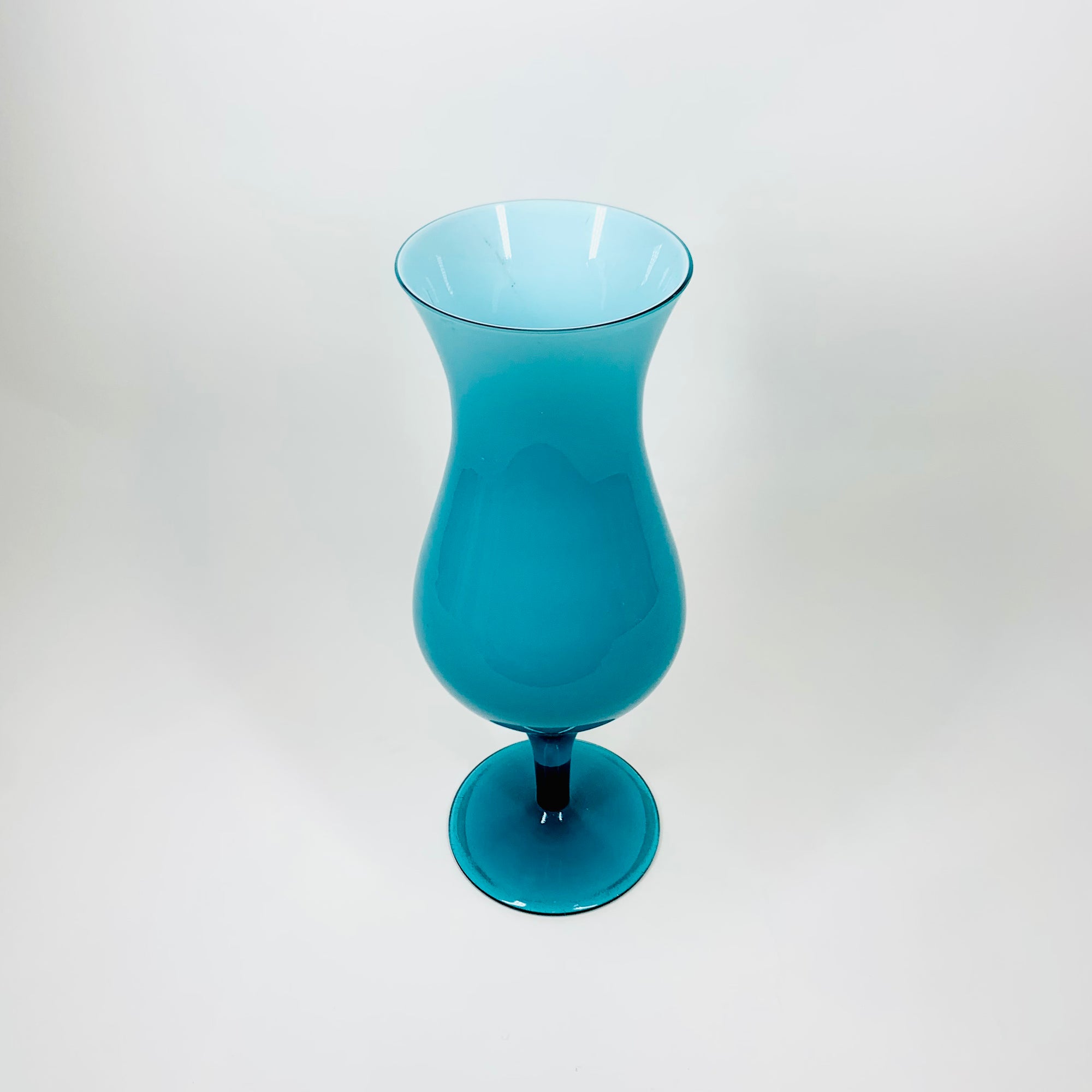 Midcentury footed Italian Empoli cased aquamarine glass vase