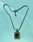 Vintage silver plated necklace with rectangular amber glass paste pendant