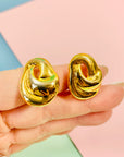 1970s French plated half knot ribbon clip on earrings